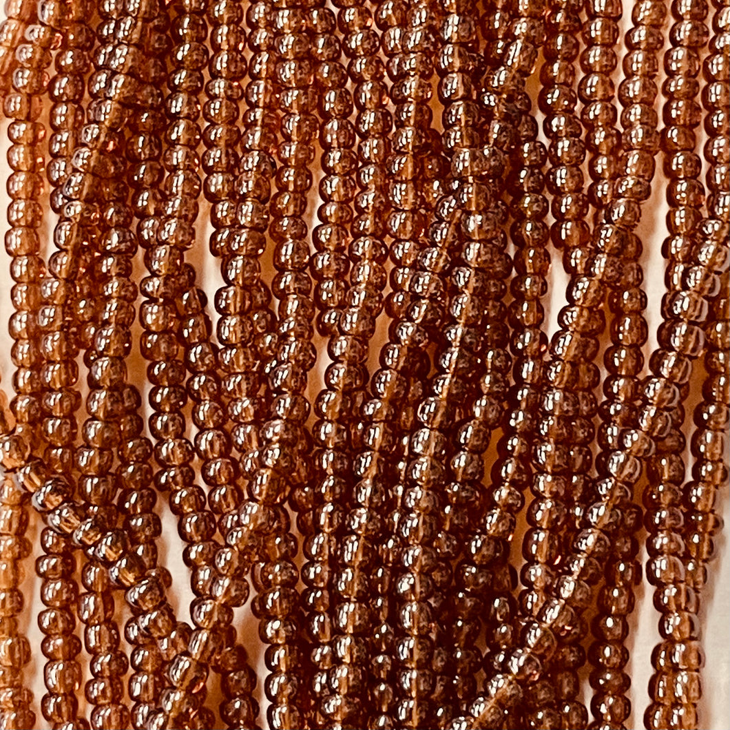 11/0 353 Dark Topaz Trans Luster