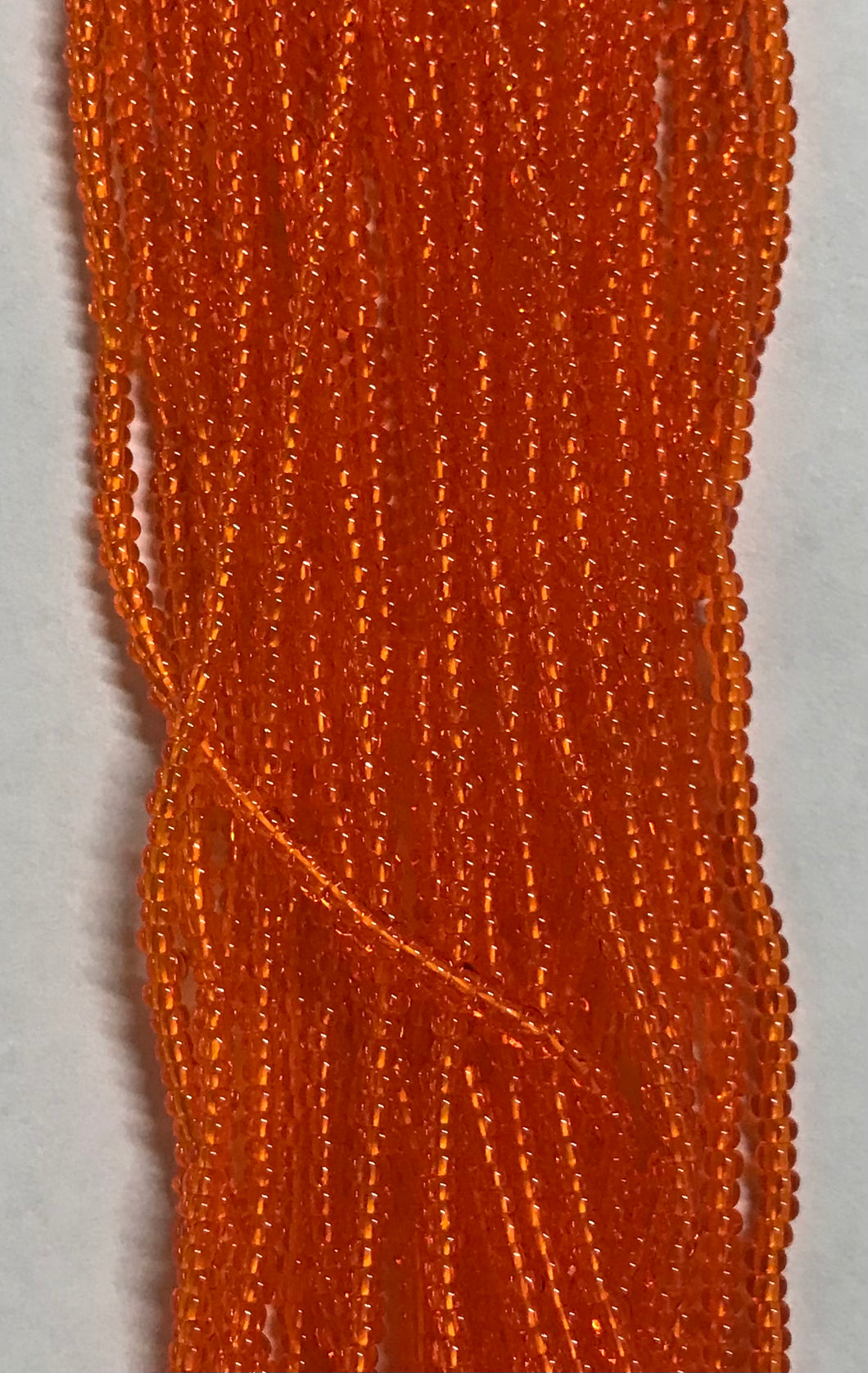 11/0 #229 Light Orange Transparent